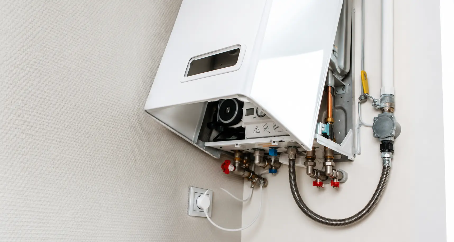 Technician completing a professional water heater installation in Spring TX